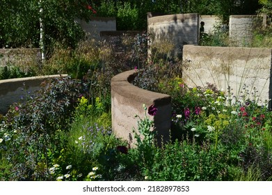 London, UK - May 24, 2022: Garden Exhibit At RHS Chelsea Flower Show In London