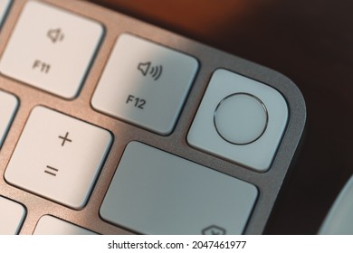 London, UK - May 25, 2021: Close Up Of Touch ID Element On New Apple Magic Keyboard Introduced In 2021 Alongside New IMac.