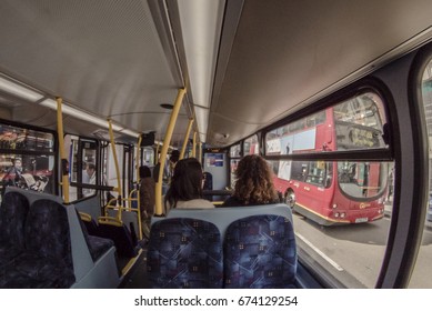 LONDON, UK - MAY 30, 2016: Passengers Inside A Red Bus Traveling Through London, UK. Interior Red Bus London.