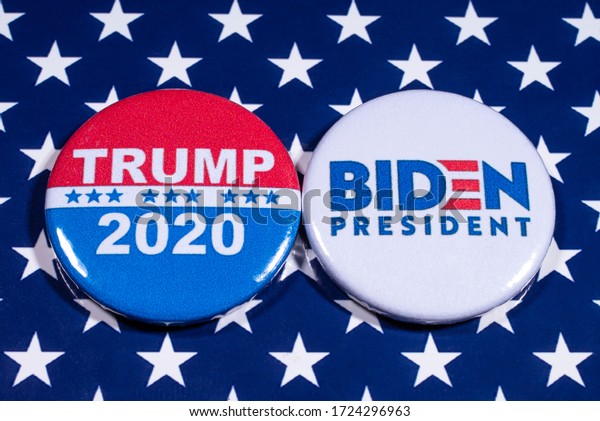 London, UK - May 5th 2020:\
Donald Trump and Joe Biden pin badges, pictured of the USA flag. \
The two men will be battling eachother in the 2020 US Presidential\
Election.
