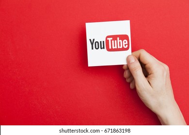 LONDON, UK - May 7th 2017: Hand Holding YouTube Logo. Youtube Is A Popular Video Sharing Service Founded In 2005