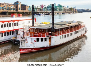 London, UK - Nov 1, 2012: The Elizabethan replica paddle steamer moored on the River Thames next to the Tower Bridge