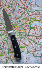 LONDON, UK - NOVEMBER 14th 2018: A Knife On A Map Of London, England. Knife Crime In London Concept