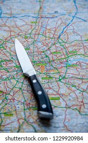 LONDON, UK - NOVEMBER 14th 2018: A Knife On A Map Of London, England. Knife Crime In London Concept