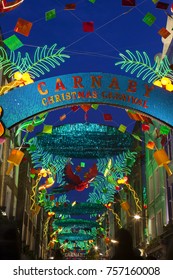 LONDON, UK - November 17th, 2017: Christmas Lights On Carnaby Street; Seasonal Lights Are Being Displayed Over Busy Shopping Area Of Central London.