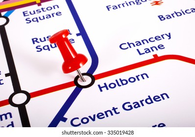 LONDON, UK - NOVEMBER 1ST 2015: A map pin marking the location of Holborn station on a London Underground Map, on 1st November 2015.