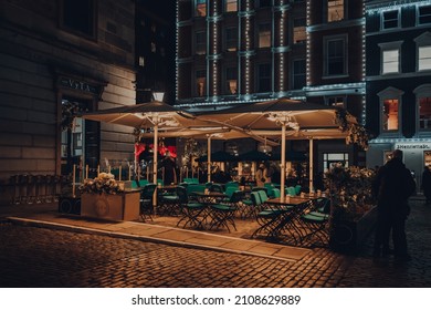 London, UK - November 23, 2021: Empty Outdoor Tables Of The Ivy Restaurant In Covent Garden, A Famous And Typically Busy Tourist Area Of London With Lots Of Shops And Restaurants.