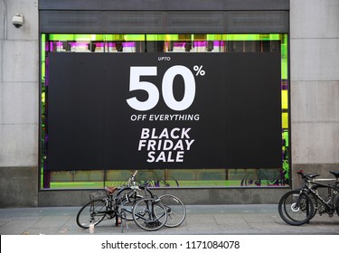 London / UK - November 25, 2017: A Black Friday Sale Poster Covering A  Window Of A Fashion Retailer