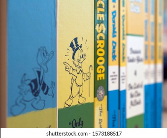 London, UK - November 28th: Close-up Of A Collection Of Don Rosa And Carl Barks Comic Works About Uncle Scrooge McDuck And Donald Duck