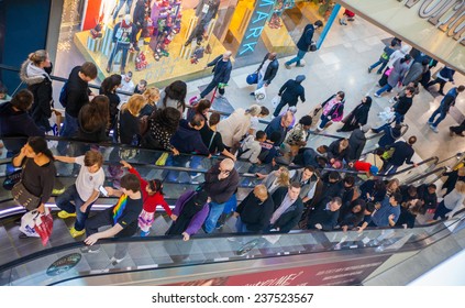 LONDON, UK - NOVEMBER 29, 2014:  Westfield Stratford City Shopping centre  with lots of people rushing for Christmas sale. 