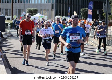 London, UK - Oct 02 2022: London Marathon. Runners At Canary Wharf