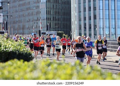 London, UK - Oct 02 2022: London Marathon. Runners At Canary Wharf