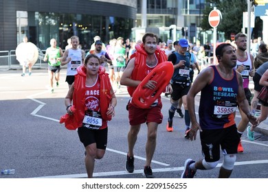 London, UK - Oct 02 2022: London Marathon. Runners At Canary Wharf