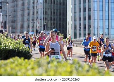 London, UK - Oct 02 2022: London Marathon. Runners At Canary Wharf