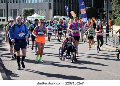 London, UK - Oct 02 2022: London Marathon. Runners At Canary Wharf