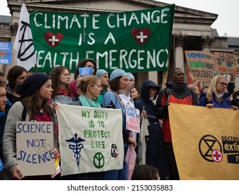 London, UK. October 12th, 2019. Doctors, nurses and other health workers seen protesting on Trafalgar Square for a health emergency at an Extinction Rebellion protest.