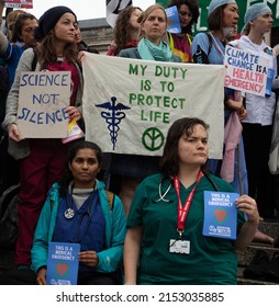 London, UK. October 12th, 2019. Doctors, nurses and other health workers seen protesting on Trafalgar Square for a health emergency at an Extinction Rebellion protest.