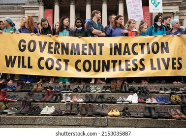 London, UK. October 12th, 2019. Doctors, nurses and other health workers seen protesting behind a banner on Trafalgar Square for a health emergency at an Extinction Rebellion protest.