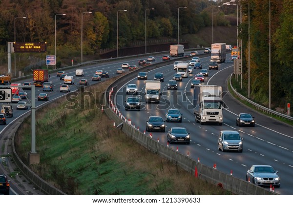 LONDON, UK - OCTOBER 18, 2018: Evening heavy\
traffic on busiest British motorway\
M25