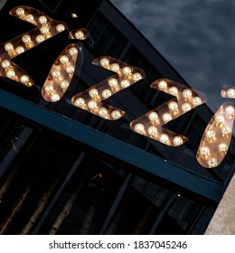 London UK October 19 2020, Close Up Illuminated Zizzi Italian Restaurant Hospitality Industry Sign