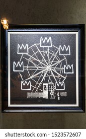 London, UK - October 2, 2019: Banksquiat, Art on display by Banksy at the street artist's Gross Domestic Product temporary showroom in Croydon, South London. Homage to New York artist Basquiat