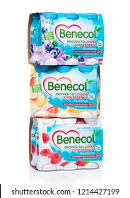 LONDON, UK - OCTOBER 20, 2018: Six Pack Of Benecol Lower Cholesterol Yogurt Drink With Fruits On White Background. 