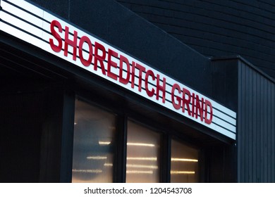 London / UK - October 2018: Close Up Of Shoreditch Grind Sign From Outside With Lights