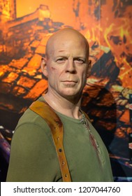 London, UK - October 2018: Madame Tussaud’s Waxwork Museum, Bruce Willis, Realistic Lifelike Model As John McClane From The Die Hard Films