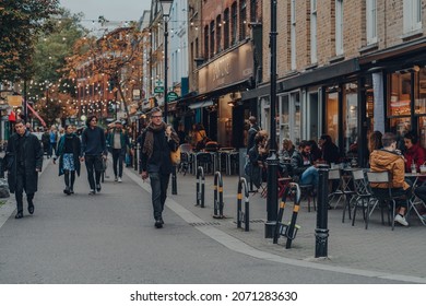 London, UK - October 23, 2021: People on Exmouth Market, a semi-pedestrianized street in Clerkenwell, Islington, and a famous street market.