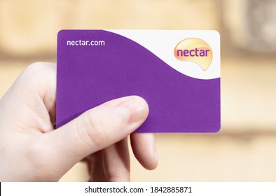 London / UK - October 28th 2020 - Holding Sainsbury's Nectar Card, Customer Loyalty Points Card. 