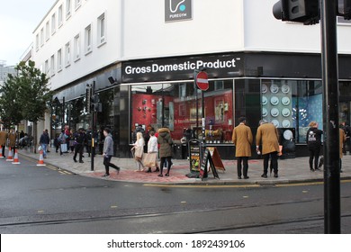 London, UK - October 4, 2019: looking at shop windows by Banksy at the street artist's Gross Domestic Product shop in Croydon, South London. Banksy opened shop due to company stealing his Banksy name