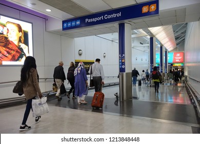 London, UK - October 6, 2018: Air Travellers Proceed To Passport Control At Heathrow Airport. The Immigration Status Of EU Citizens Remains Unclear Following Brexit.