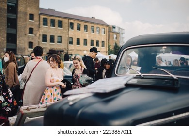 London UK - October 9, 2021: The Classic Car Boot Sale Event At Kings Cross. People Buying And Selling Vintage Fashion, Accessories, And Homeware Traders Operating From The Boot Of Vintage Vehicles.