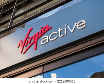 London, UK, October 9th 2022: Virgin Active, Located At 5 Old Broad St, London EC2N 1DW. State Of The Art Gym Floor, A Swimming Pool, Spa, Cycle Studio And Fitness Classes. The Main Entrance Logo Sign