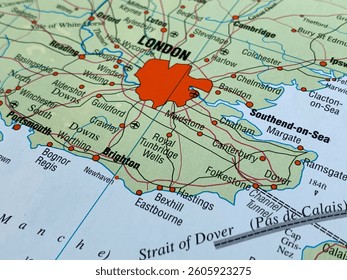 London, UK, a photo of a world atlas map, suitable to illustrate travel, tourism, economy and politics topics
