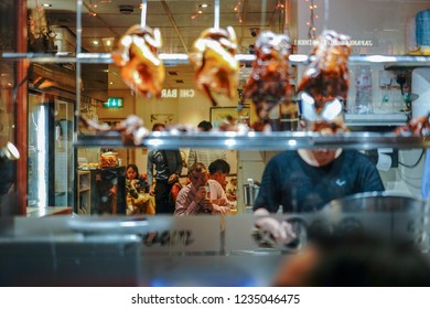 London, Uk - SEPT, 2018: Crispy Duck Restaurant Store Front In China Town, Soho London. Fried Duck, Chicken And Pork Hanging.