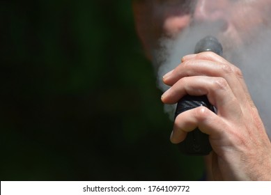 London, UK. Sept 26 2020. A Man Vaping His Hand Holding An E Cigarette / Mod. This Week Florida Saw A Spike In Teenage Vaping Related Hospitalisations And Lung Disease Not Related To Covid-19