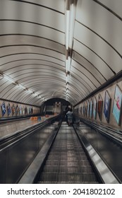 London, UK - September 03, 2021: Downward escalator at Moorgate London Underground station, the oldest underground railway in the world, selective focus.