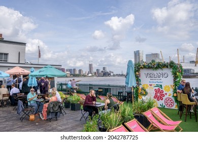 London, UK - September 12 2021: The Gun Pub Garden In Docklands With View Of The River Thames And The O2 Arena