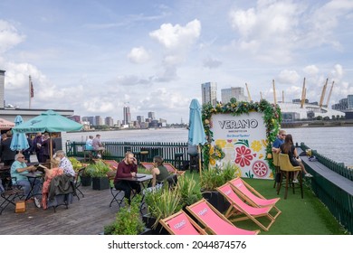 London, UK - September 12 2021: The Gun Pub Garden In Docklands With View Of The River Thames And The O2 Arena