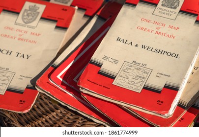 LONDON, UK - SEPTEMBER 14, 2019:   Collection Of Old Vintage Ordnance Survey Maps Featuring Bala And Welshpool.  One-Inch Maps For Use As A Background