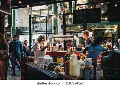 London, UK - September 17, 2018: Staff Preparing Food At Northfield Butchery Market Stand In Borough Market, One Of The Largest And Oldest Markets In London, UK.