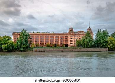 London, UK - September 18 2018: The Harrods Furniture Depository buildings on the south bank of the River Thames, in Barnes. Once a storage center, it is now converted to residential estate.
