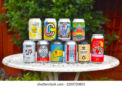 London UK - September 18 2022 Ten Cans Of Craft Beer On A White Vintage Table In My Garden Ready To Start Oktoberfest Themed Party For Family And Friends Making The Most Of The Indian Summer This Year