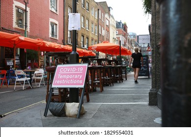 London / UK - September 19, 2020 - A Deserted Outside Seating Area Of A  Bar In Soho During The Covid Pandemic 