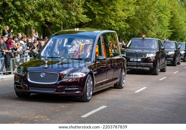 LONDON, UK -\
September 19, 2022: State Hearse with Her Majesty’s coffin Drives\
along South Carriage Drive, Her Majesty Queen Elizabeth II State\
Funeral Procession, London,\
UK