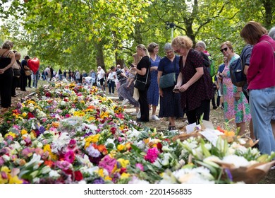 LONDON, UK - September 2022: Thousands Of People Lay Flowers And Cards In Green Park In Tribute To Queen Elizabeth II After Her Death