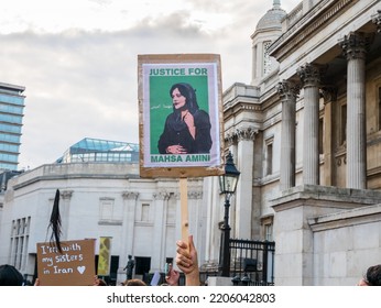 London, UK, September 24th 2022:The Protest In Trafalgar Square Was Over The Death In Iranian Police Custody Of Mahsa Amini. A Young Woman Holds Up A Sign Placard.