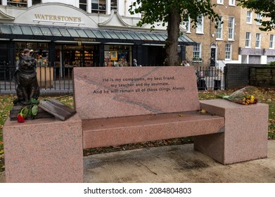 London, UK - September 28th 2021: Memorial To A Street Cat Named Bob With A Bunch Of Flowers Resting On The Side