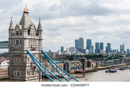 London, UK In Summertime - Tower Bridge, Skyscrapers Of Canary Wharf And The Financial District And River Thames.  Unique Elevated Aerial View From Above. Cloudy Scattered Sky